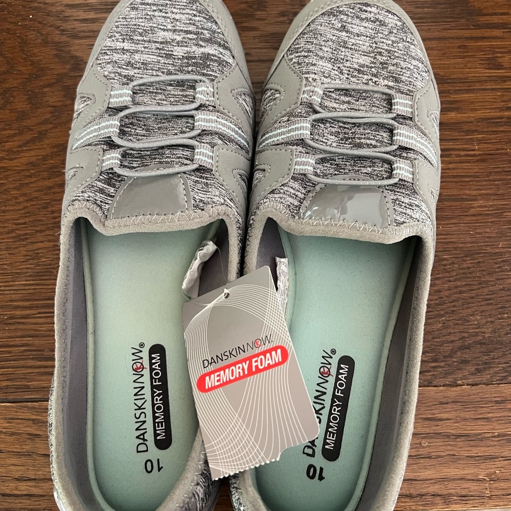 New with tags, sketchers slip on shoes.